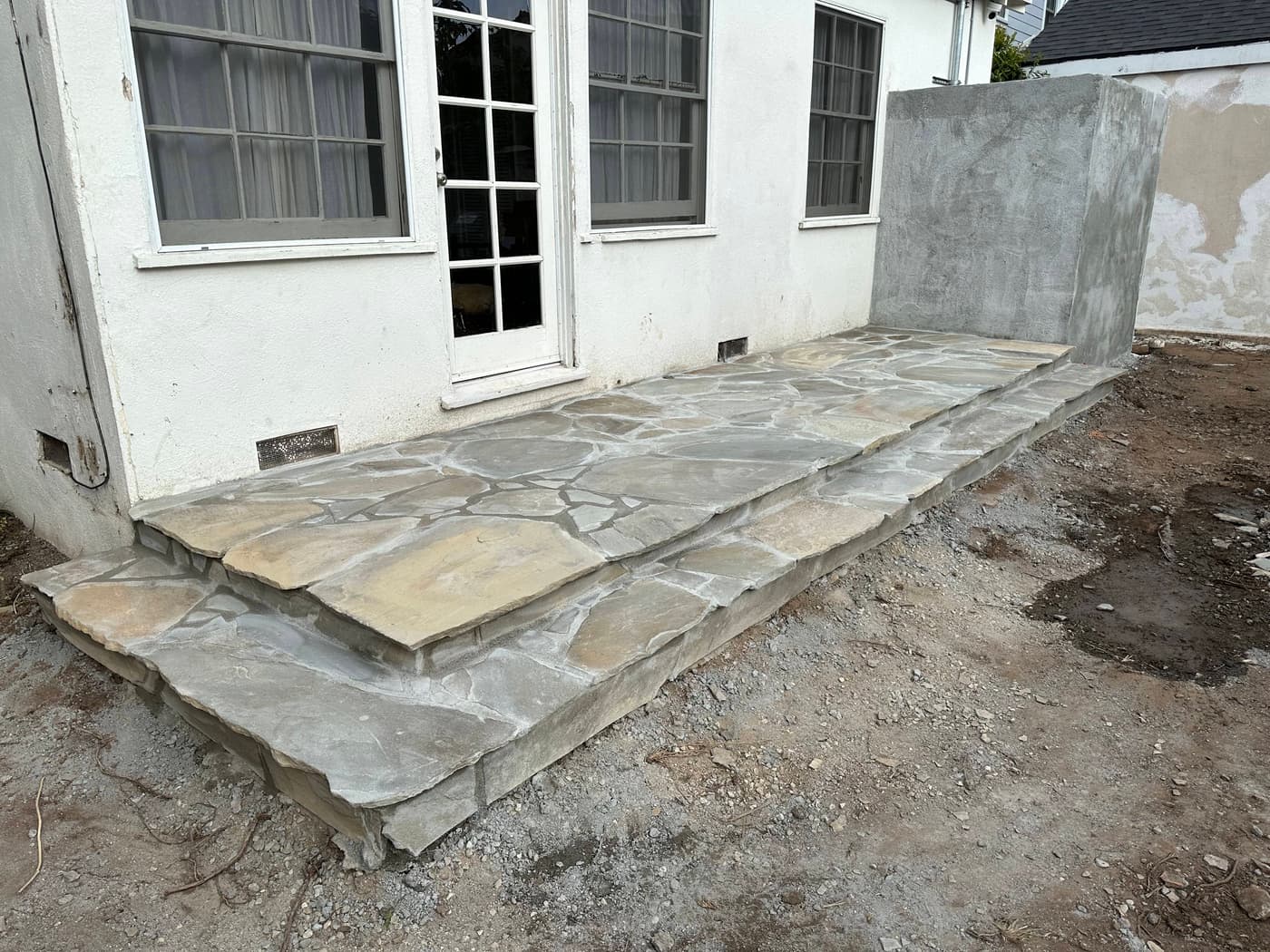 Concrete Steps at Patio Door